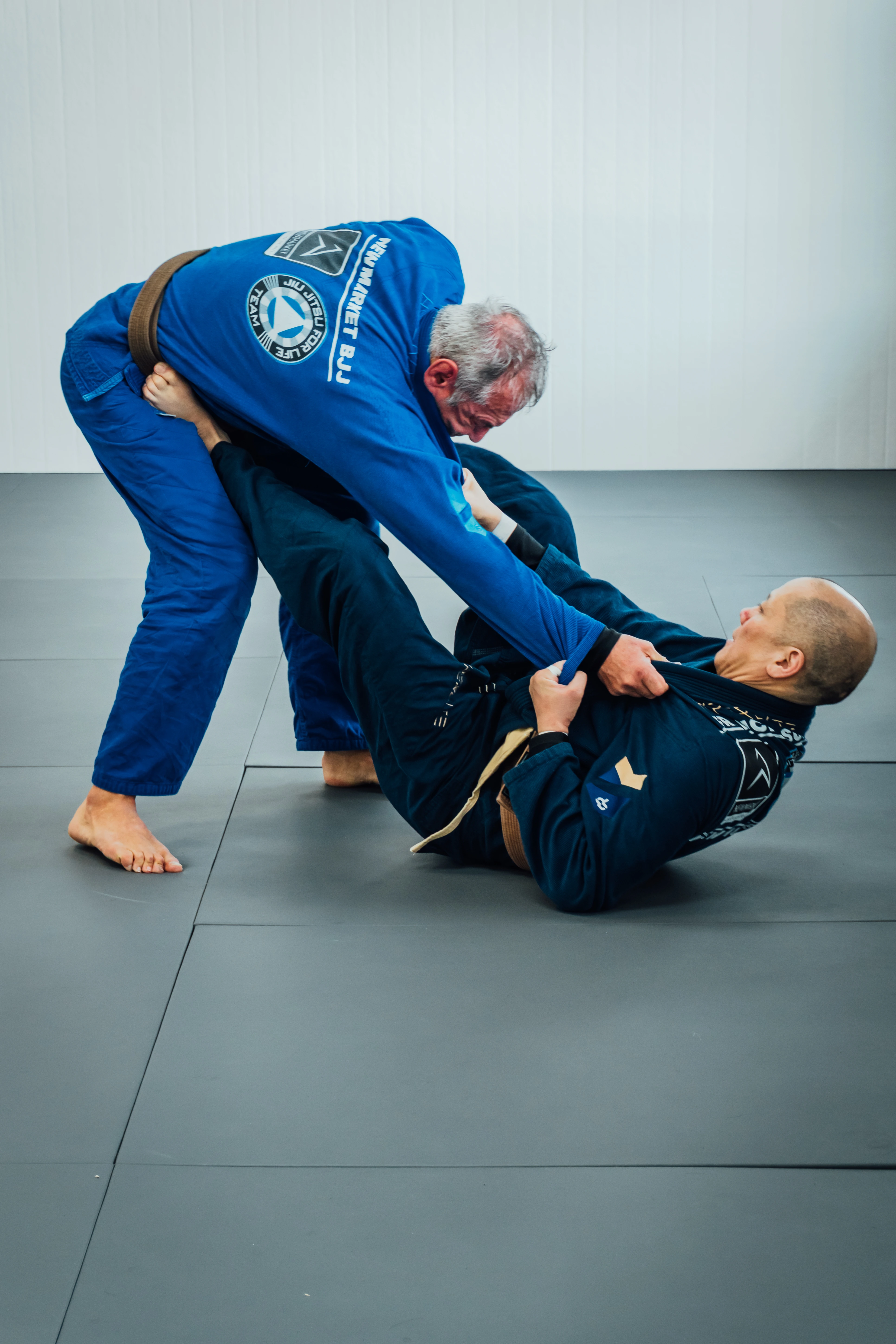 Instructor demonstrating an armbar technique